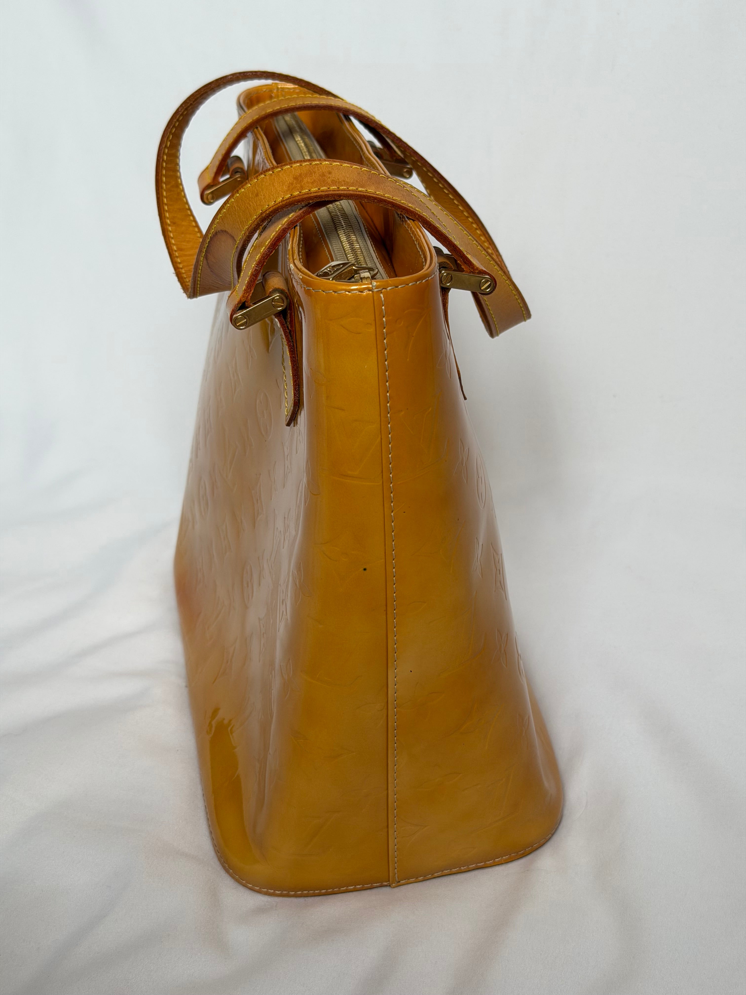 Louis Vuitton Houston in Yellow Vernis Leather