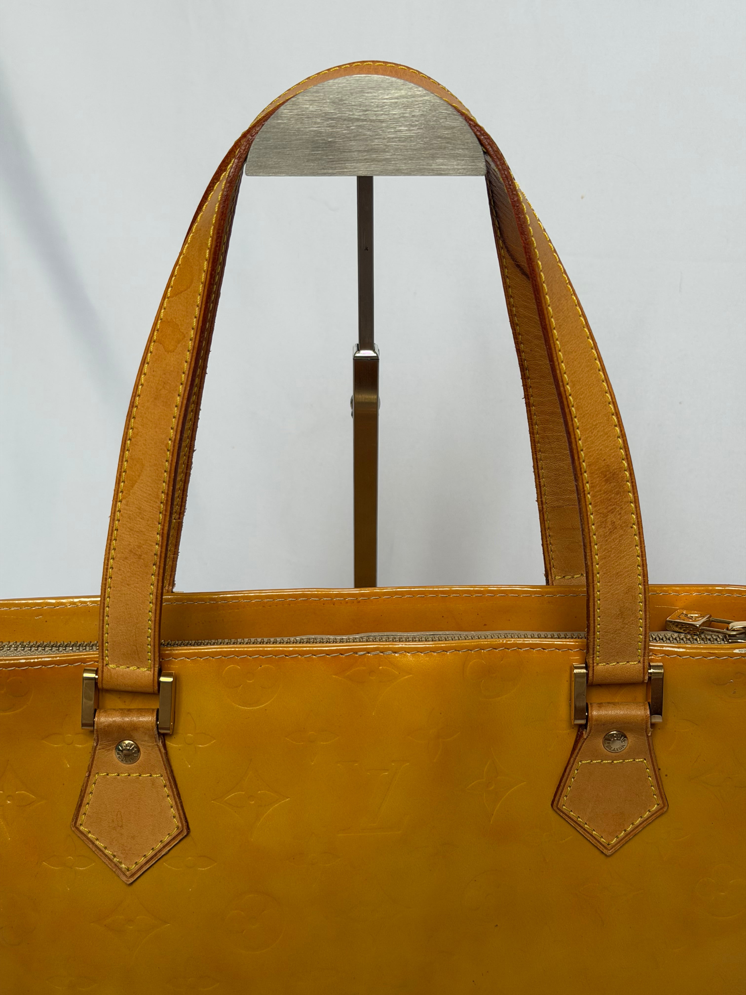 Louis Vuitton Houston in Yellow Vernis Leather