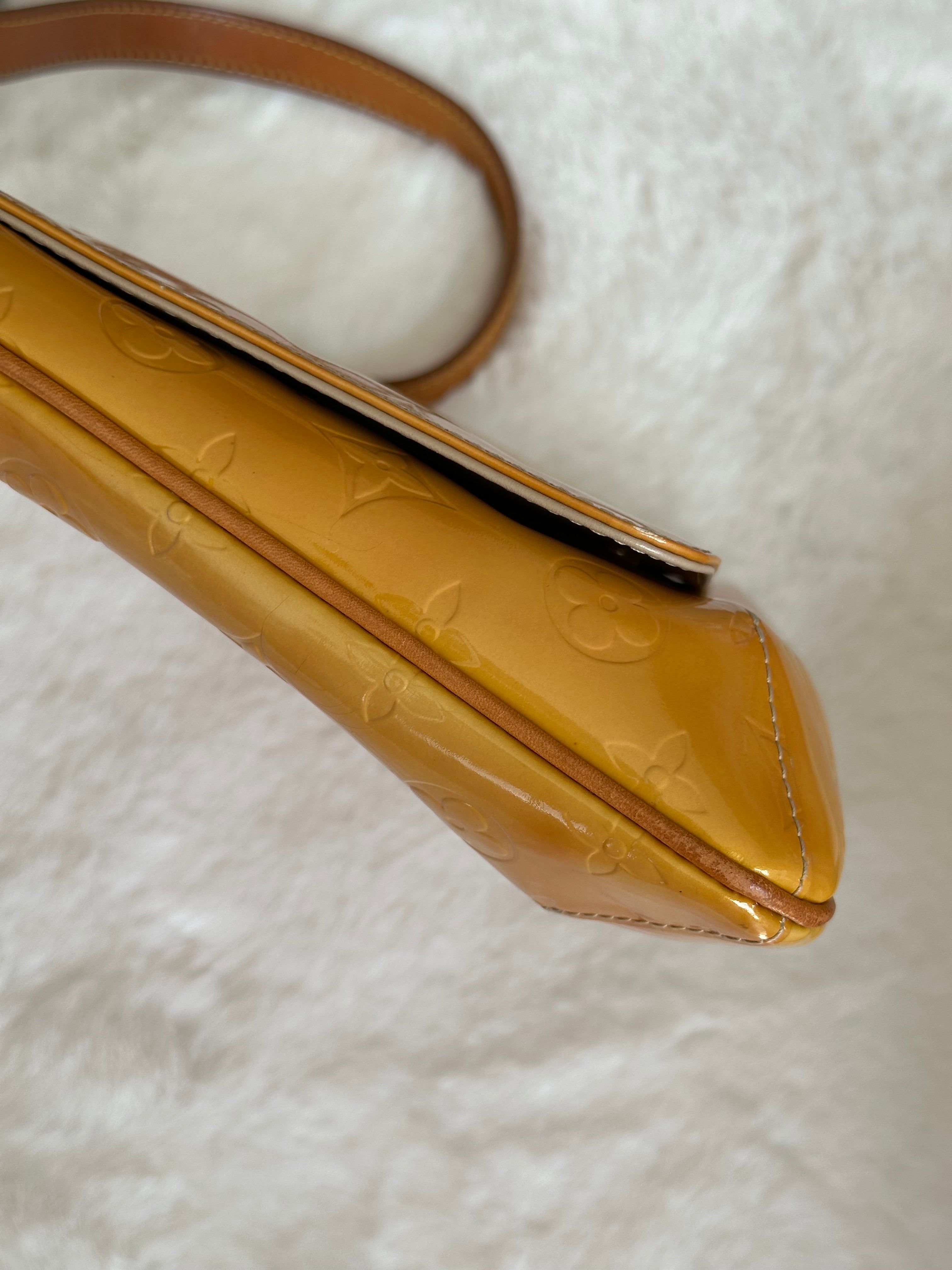 Louis Vuitton Thompson Street in Orange Vernis Leather