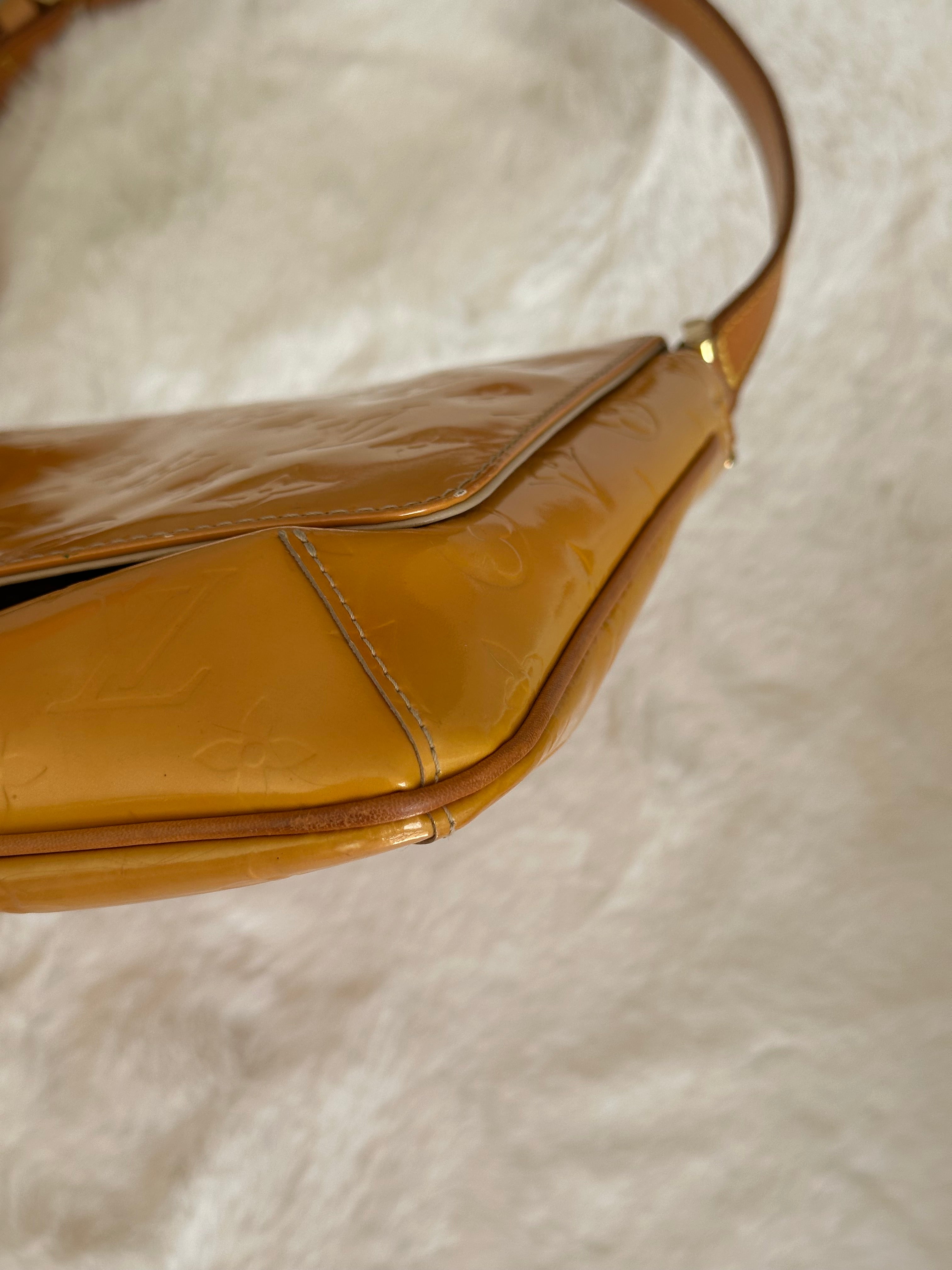 Louis Vuitton Thompson Street in Orange Vernis Leather