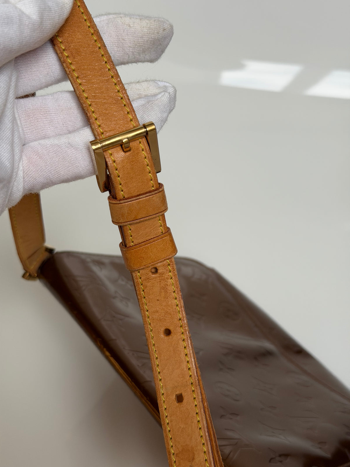 Louis Vuitton Thompson Street in Bronze Vernis Leather