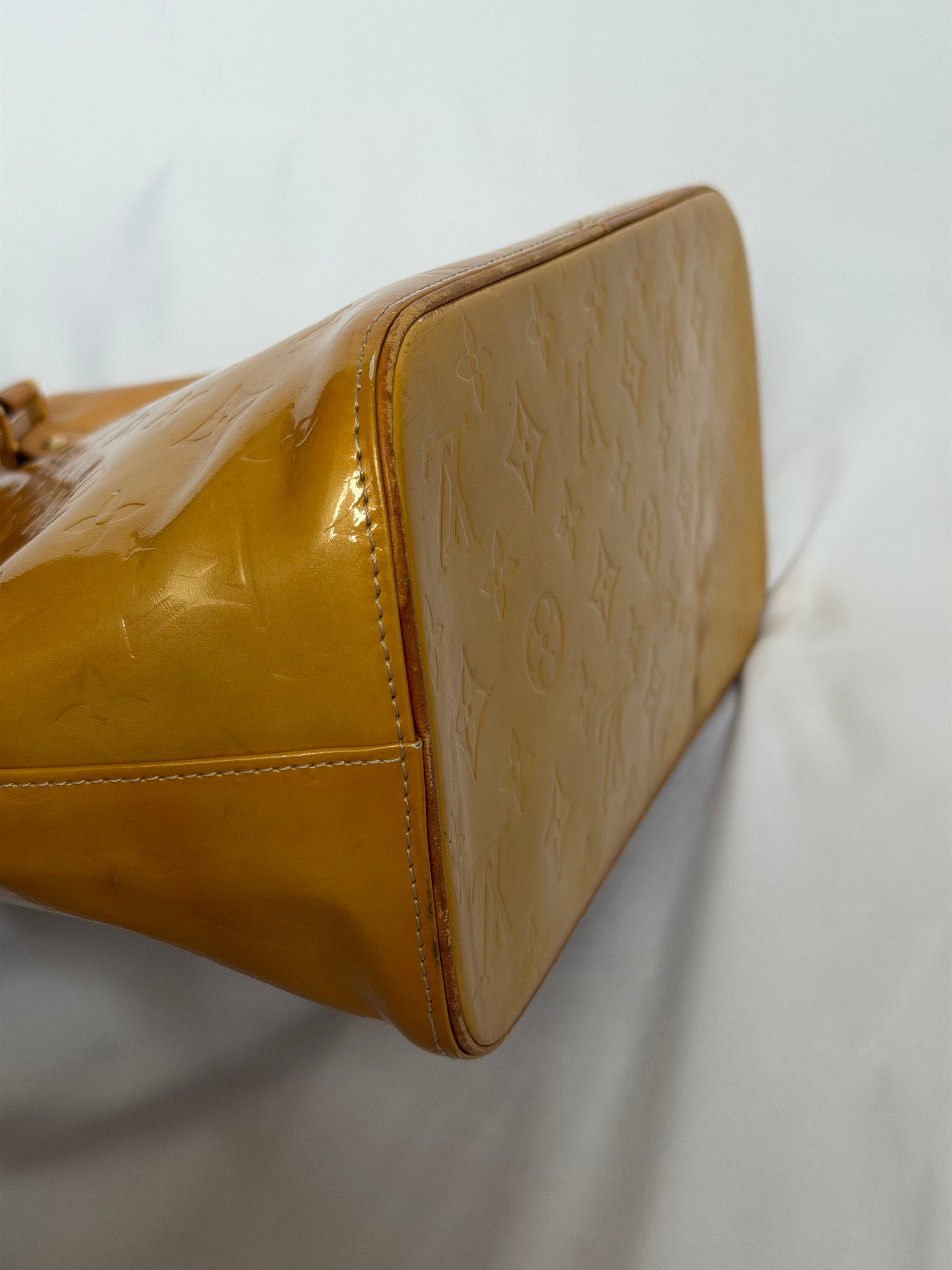 Louis Vuitton Houston in Yellow Vernis Leather