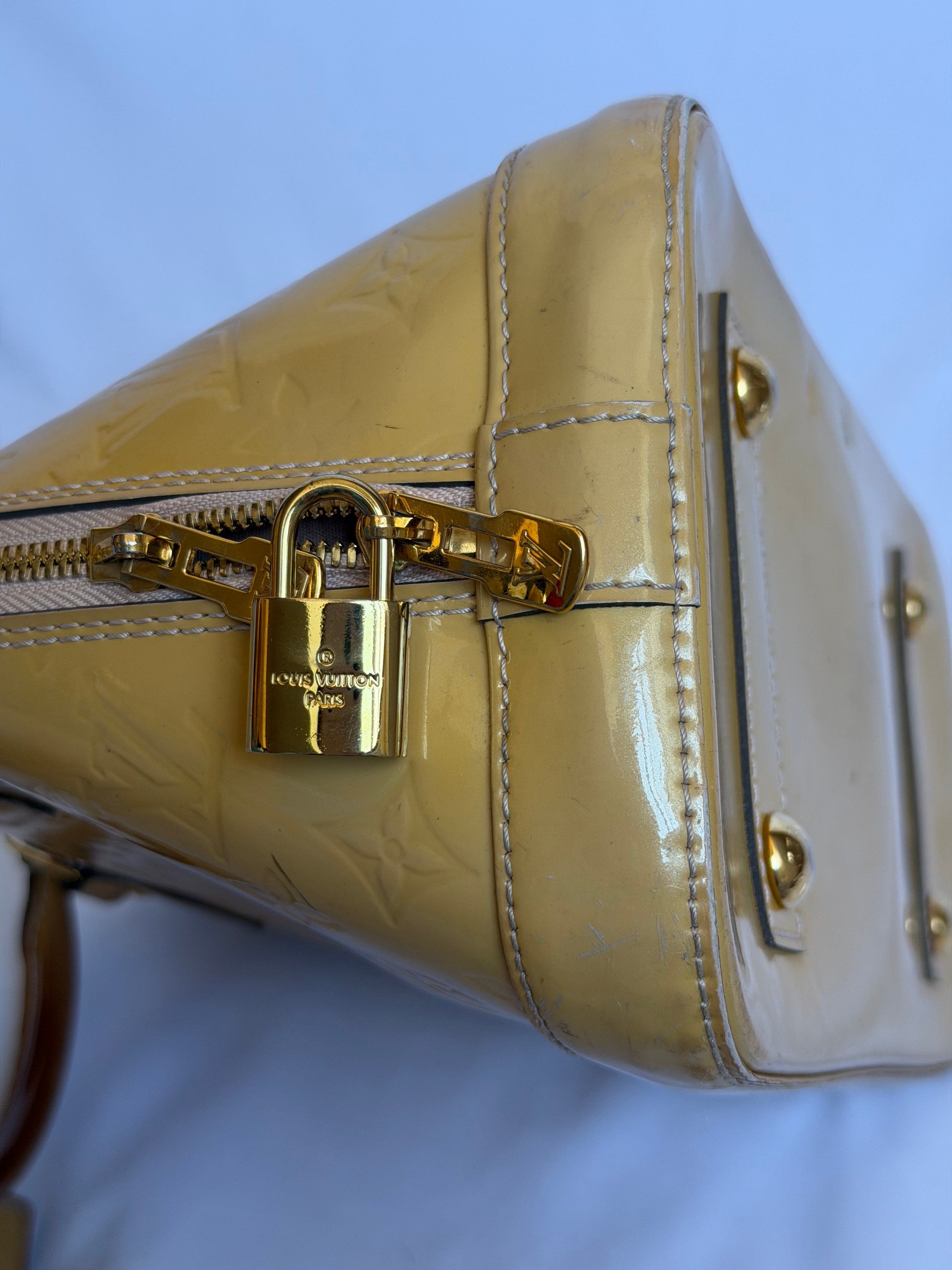 Louis Vuitton Alma PM in Yellow Vernis