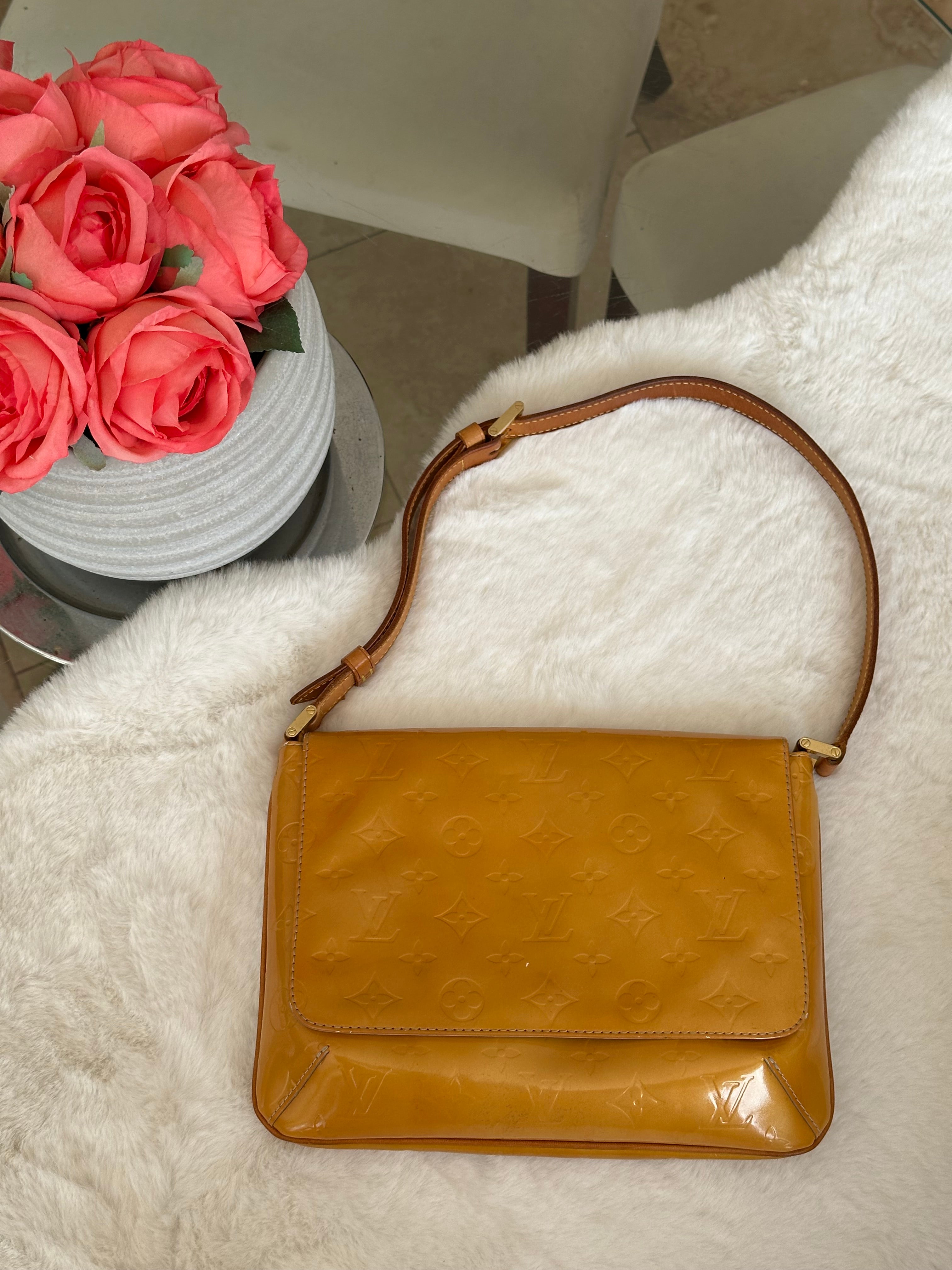 Louis Vuitton Thompson Street in Orange Vernis Leather
