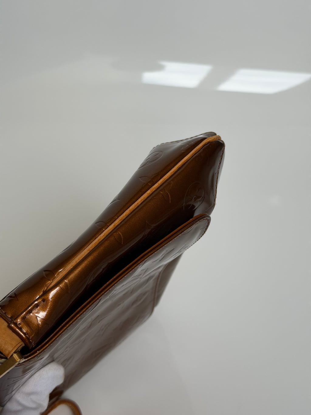 Louis Vuitton Thompson Street in Bronze Vernis Leather