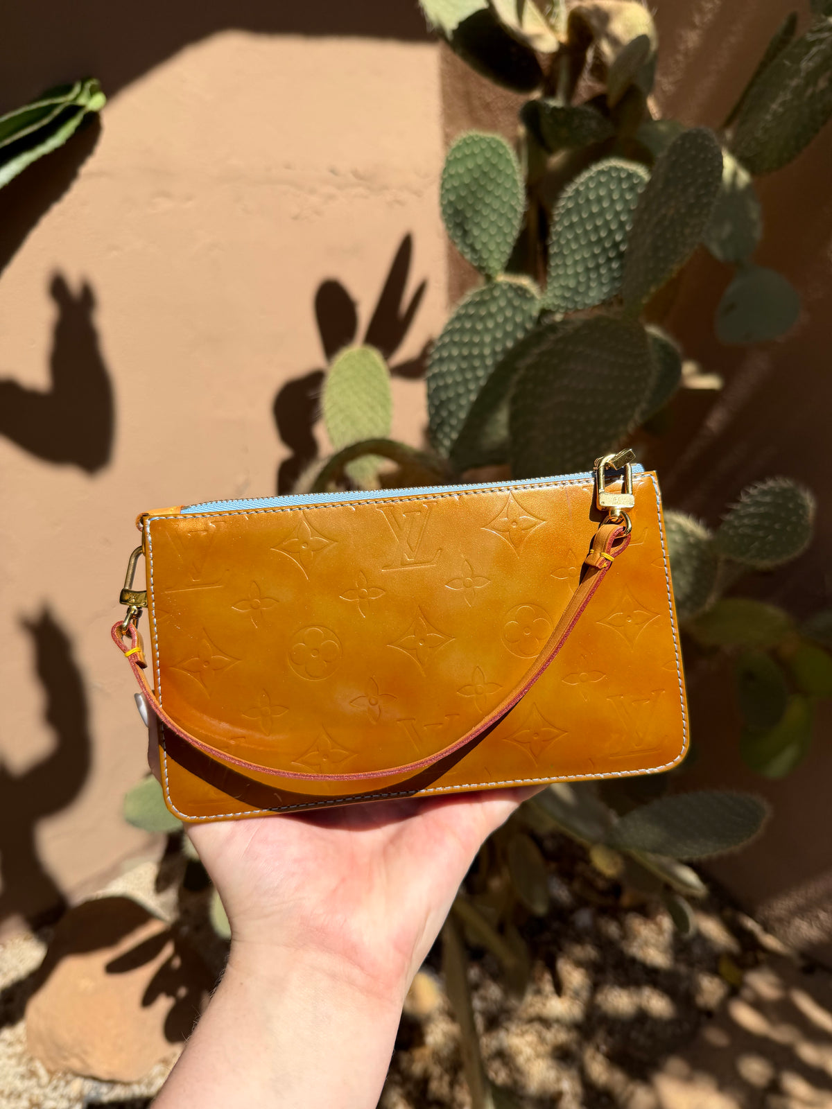 Louis Vuitton Lexington Pochette in Bronze Vernis Leather