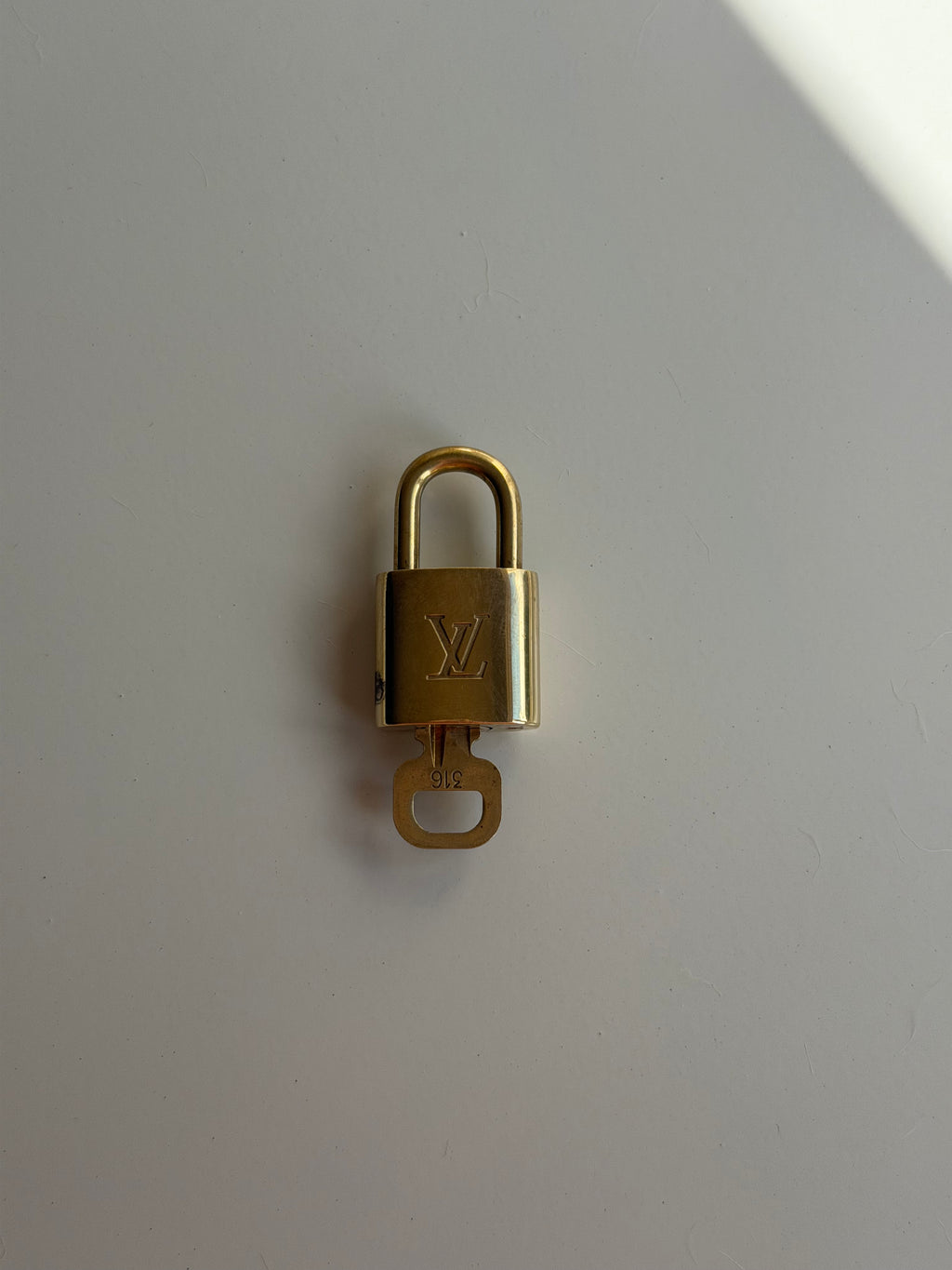 Louis Vuitton Lock & Key - 316