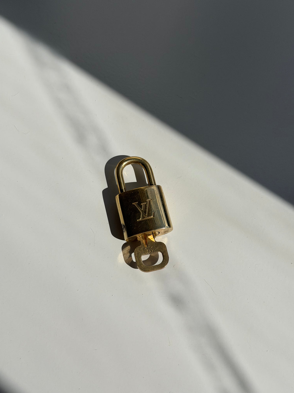 Louis Vuitton Lock & Key - 316