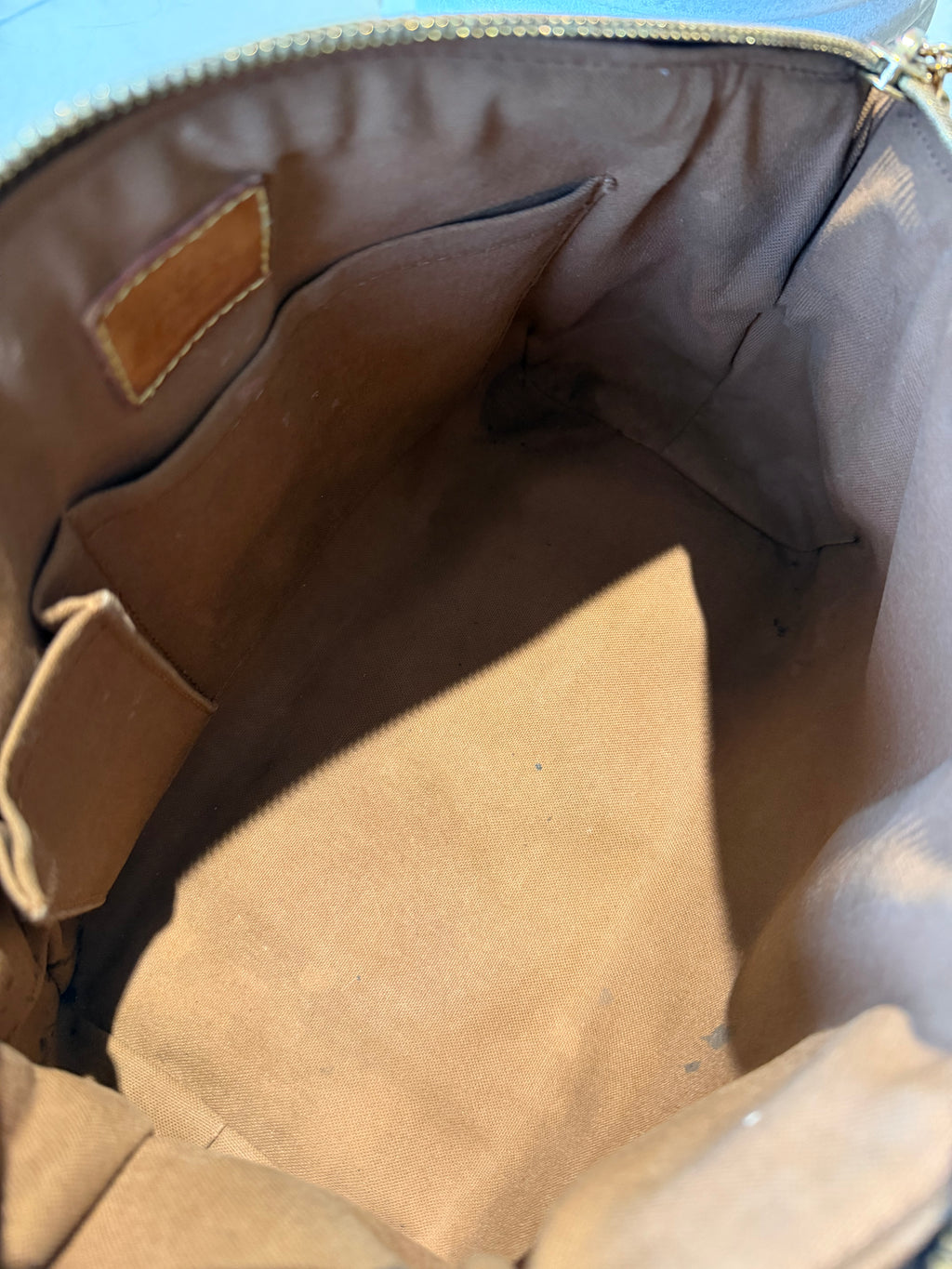 Louis Vuitton Tivoli PM in Monogram Canvas