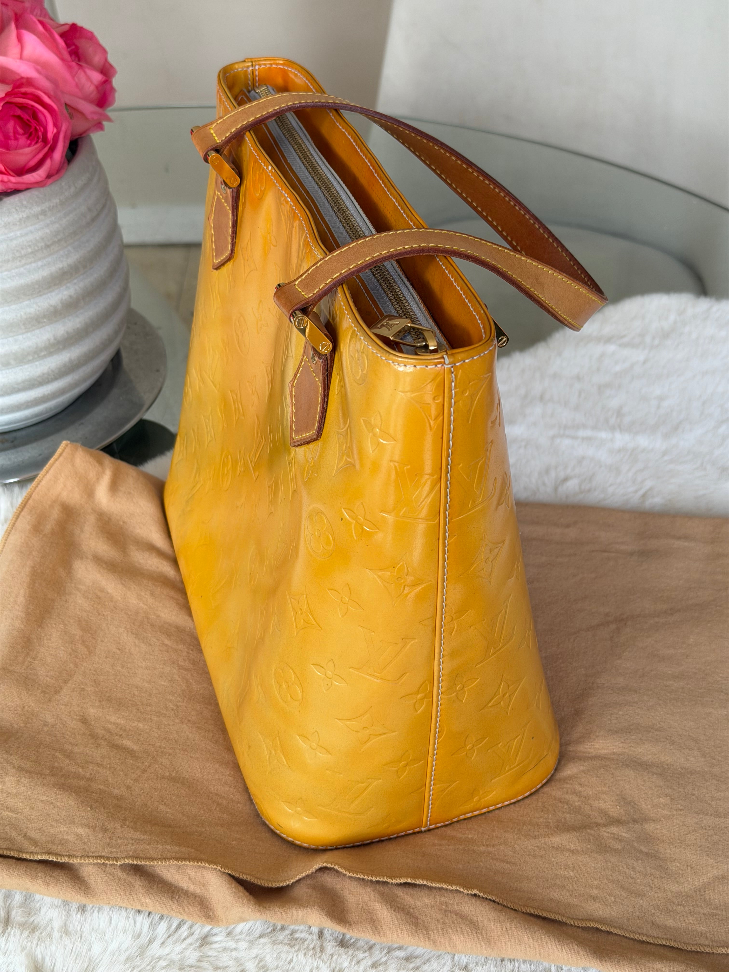 Louis Vuitton Houston in Yellow Vernis Leather