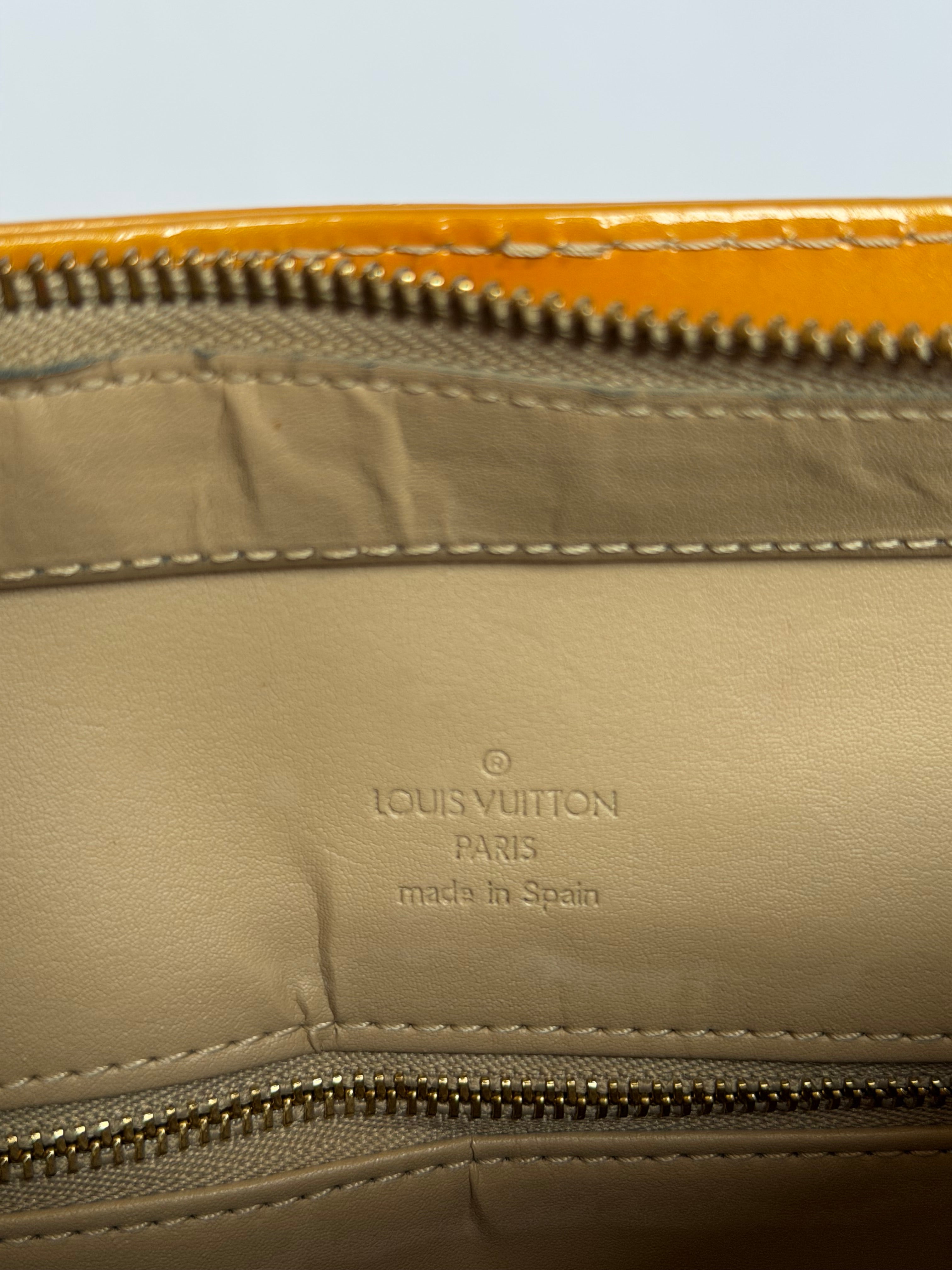 Louis Vuitton Houston in Yellow Vernis Leather