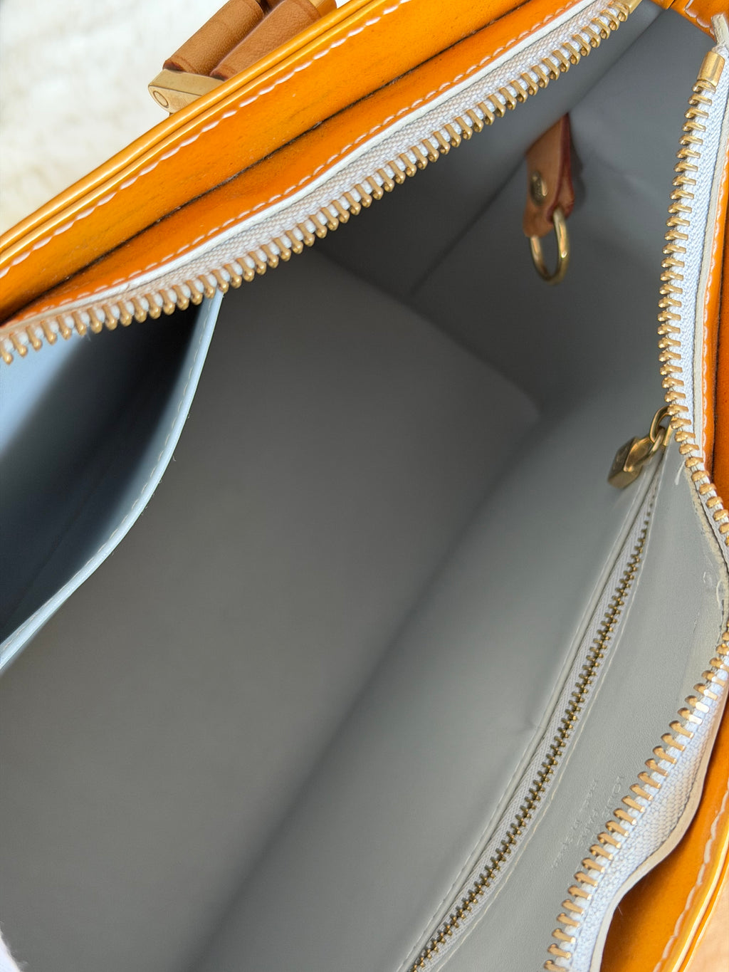 Louis Vuitton Houston in Yellow Vernis Leather