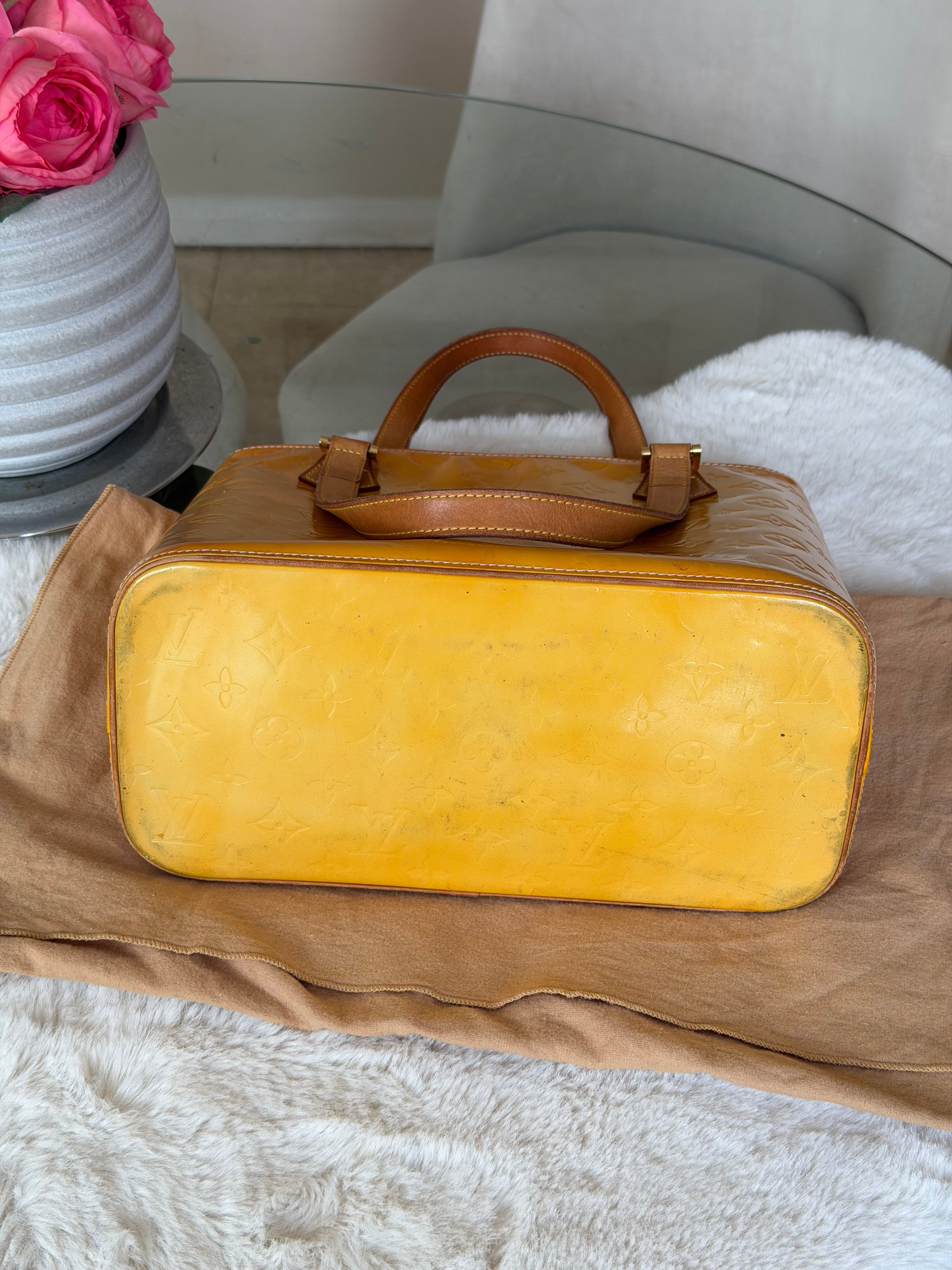 Louis Vuitton Houston in Yellow Vernis Leather