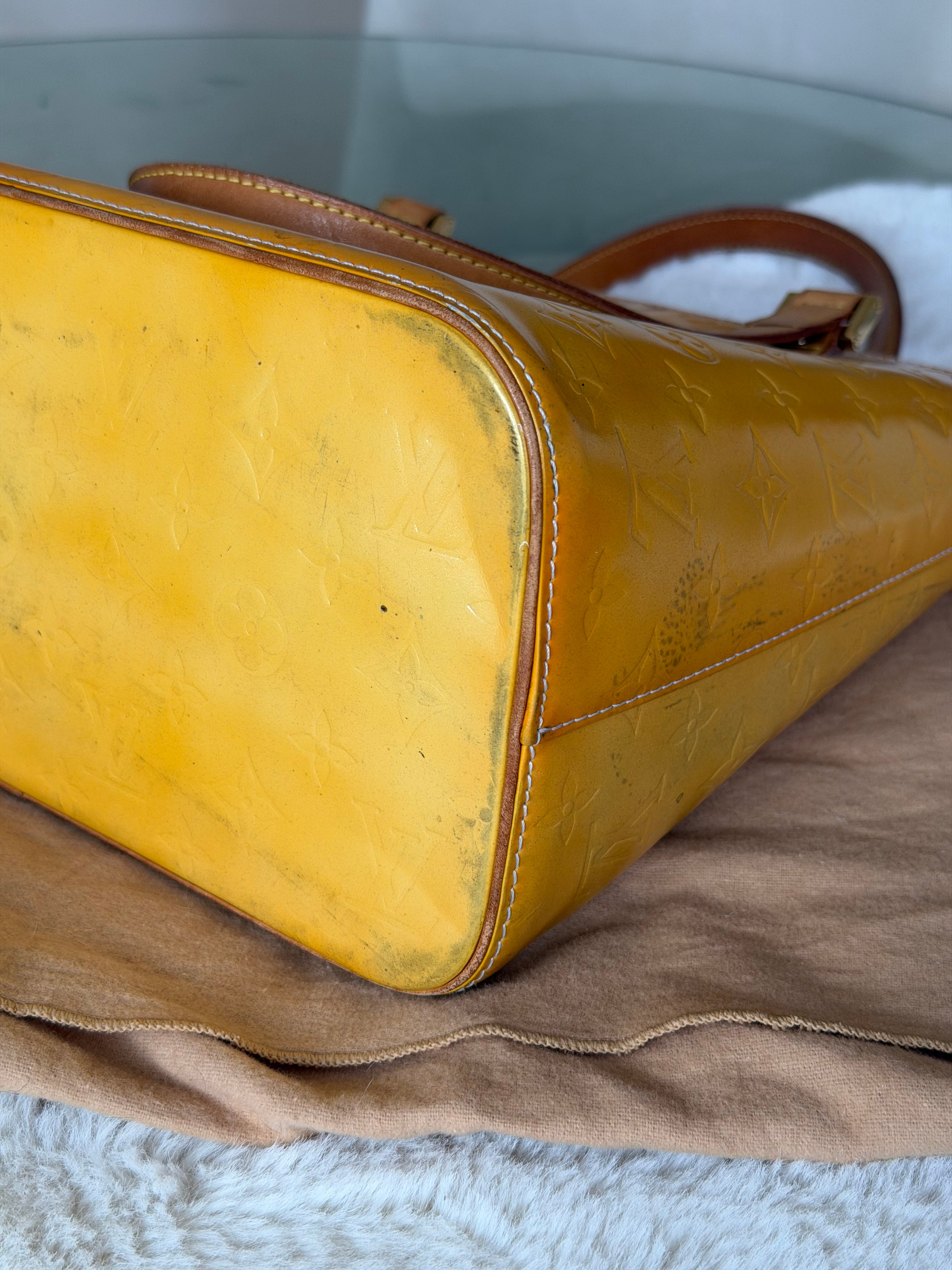 Louis Vuitton Houston in Yellow Vernis Leather