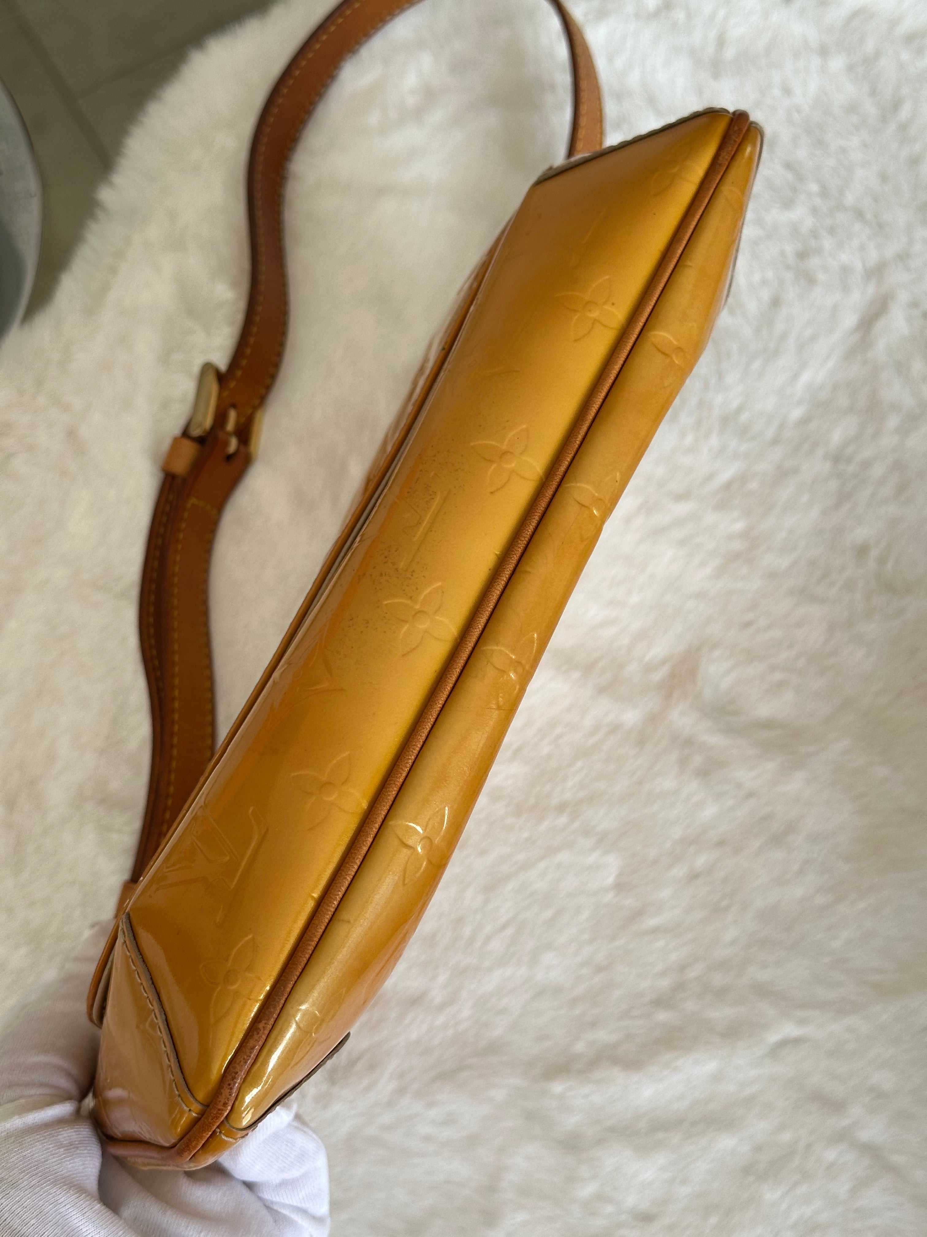 Louis Vuitton Thompson Street in Orange Vernis Leather