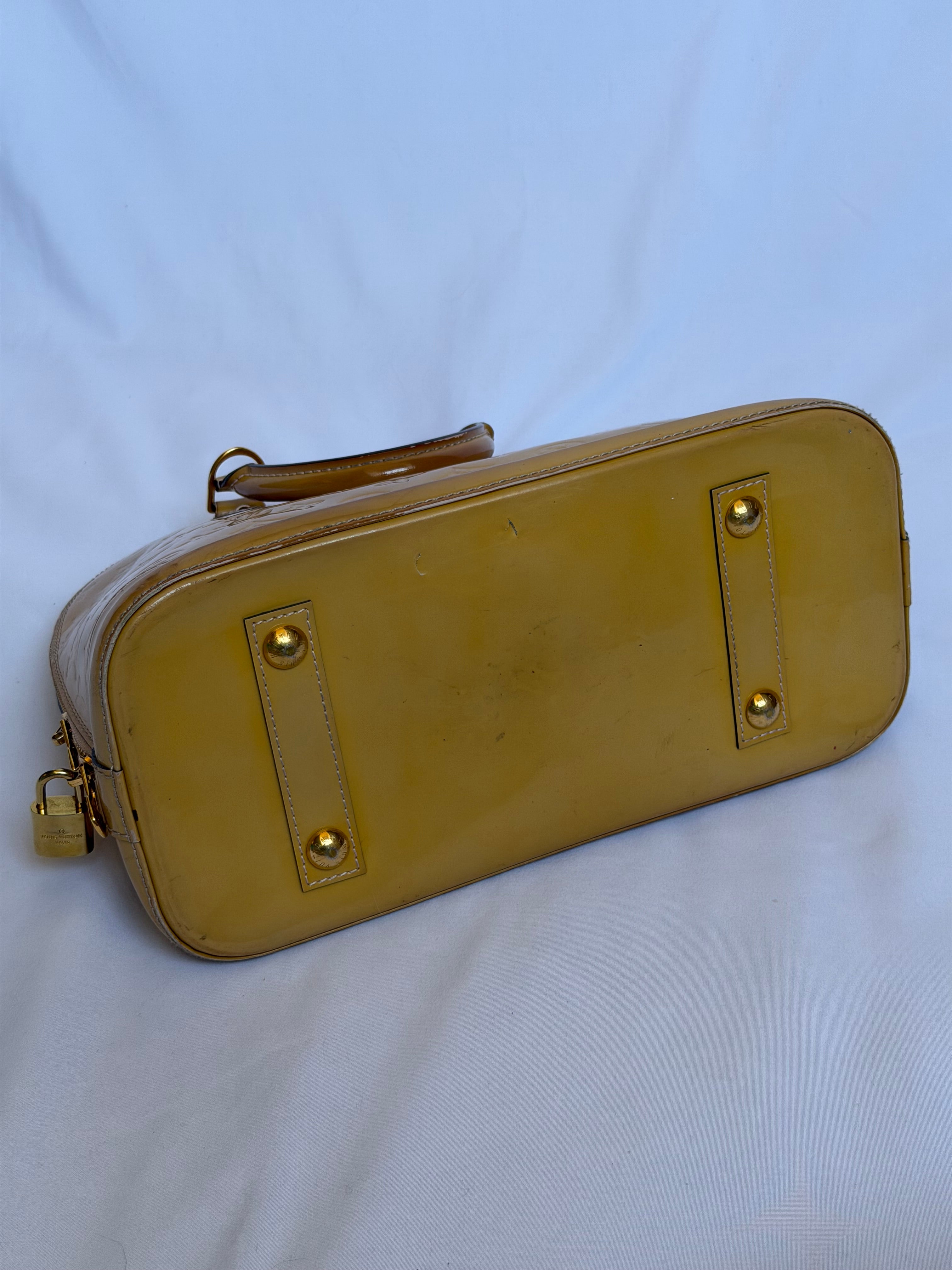 Louis Vuitton Alma PM in Yellow Vernis