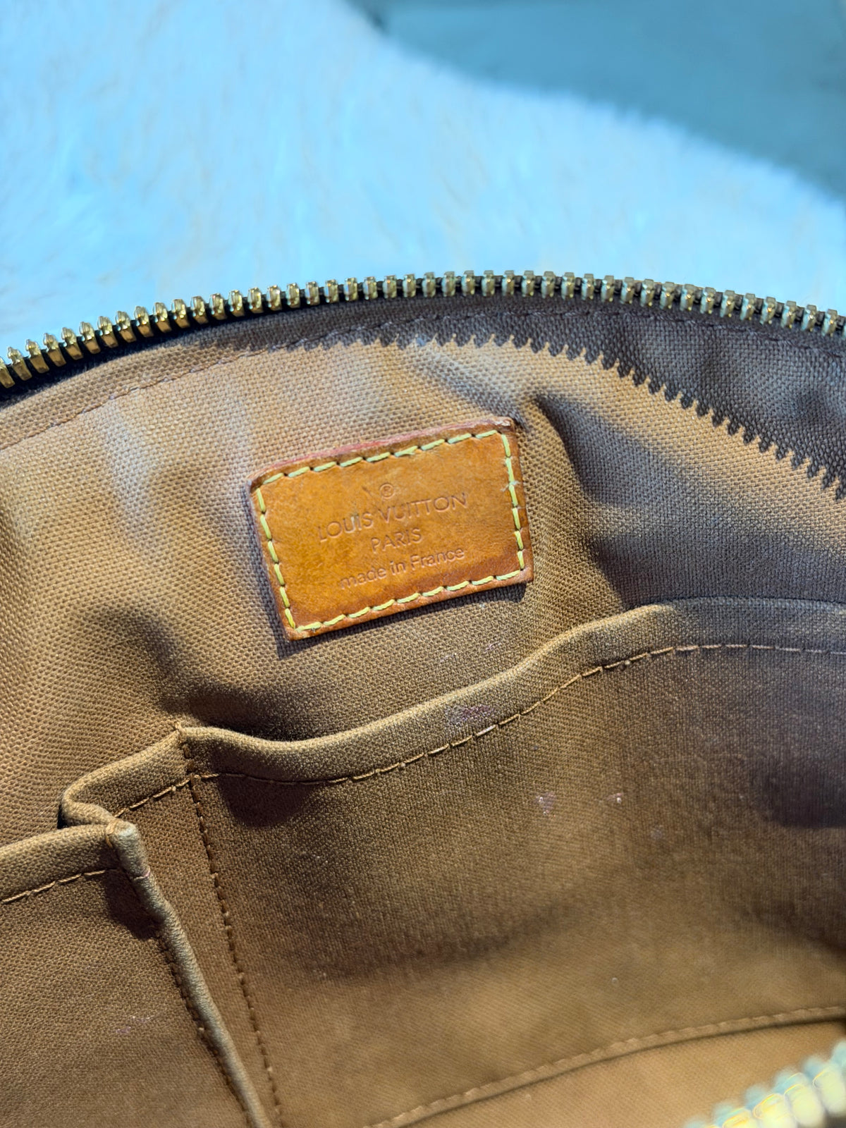 Louis Vuitton Tivoli PM in Monogram Canvas