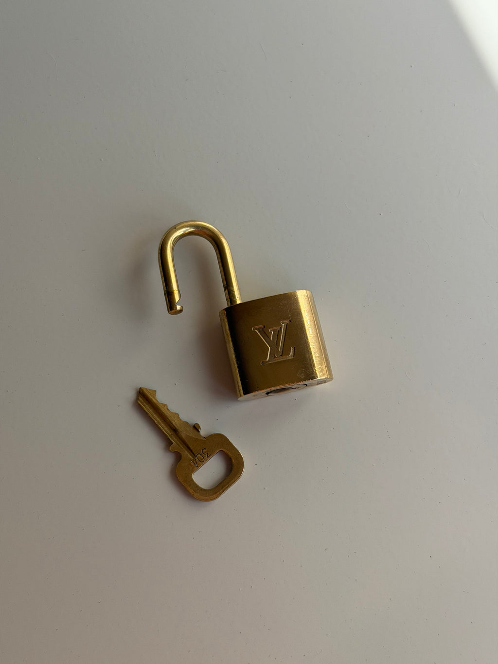 Louis Vuitton Lock & Key - 304
