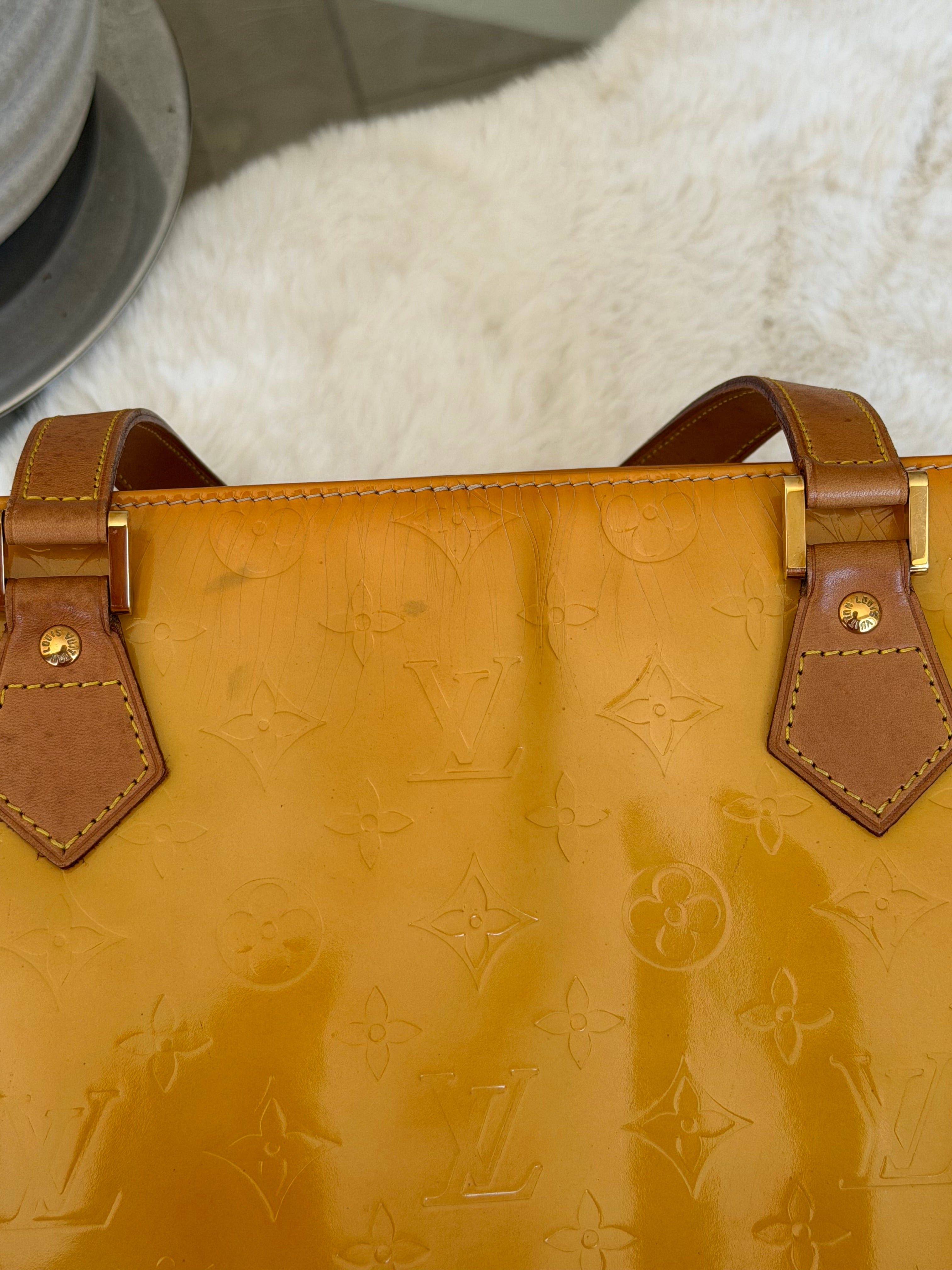 Louis Vuitton Houston in Yellow Vernis Leather