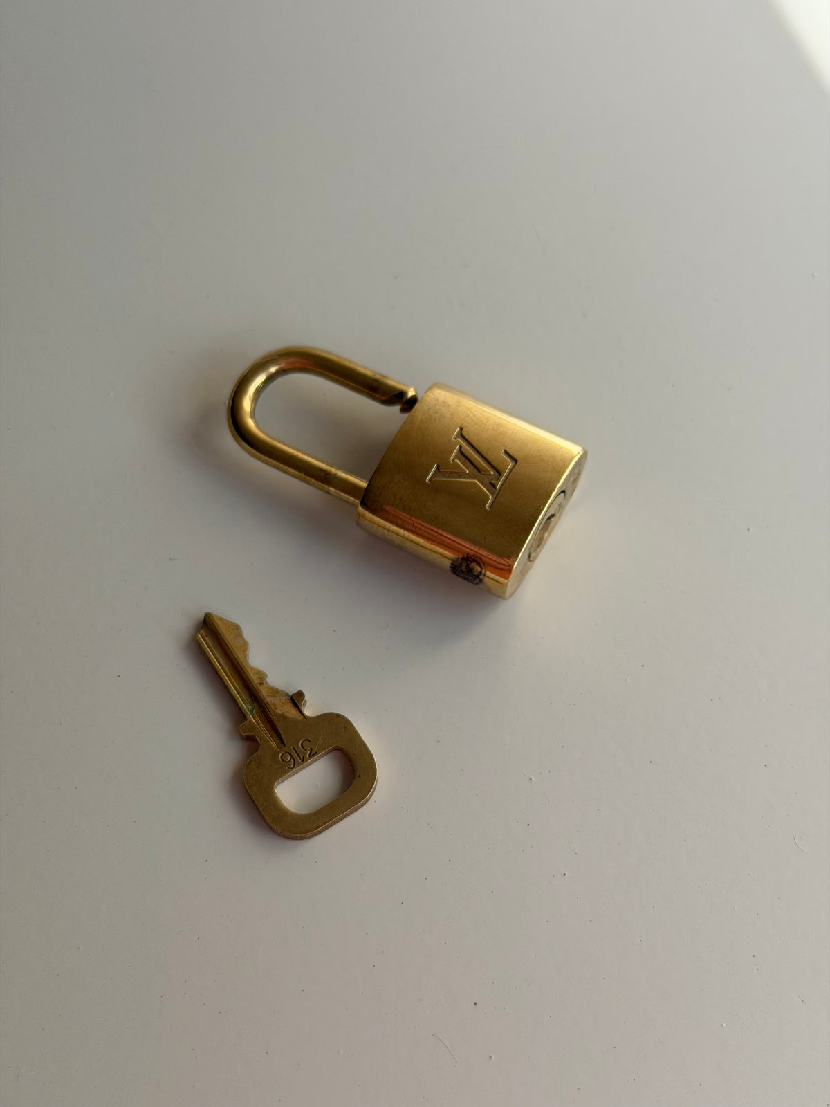 Louis Vuitton Lock & Key - 316
