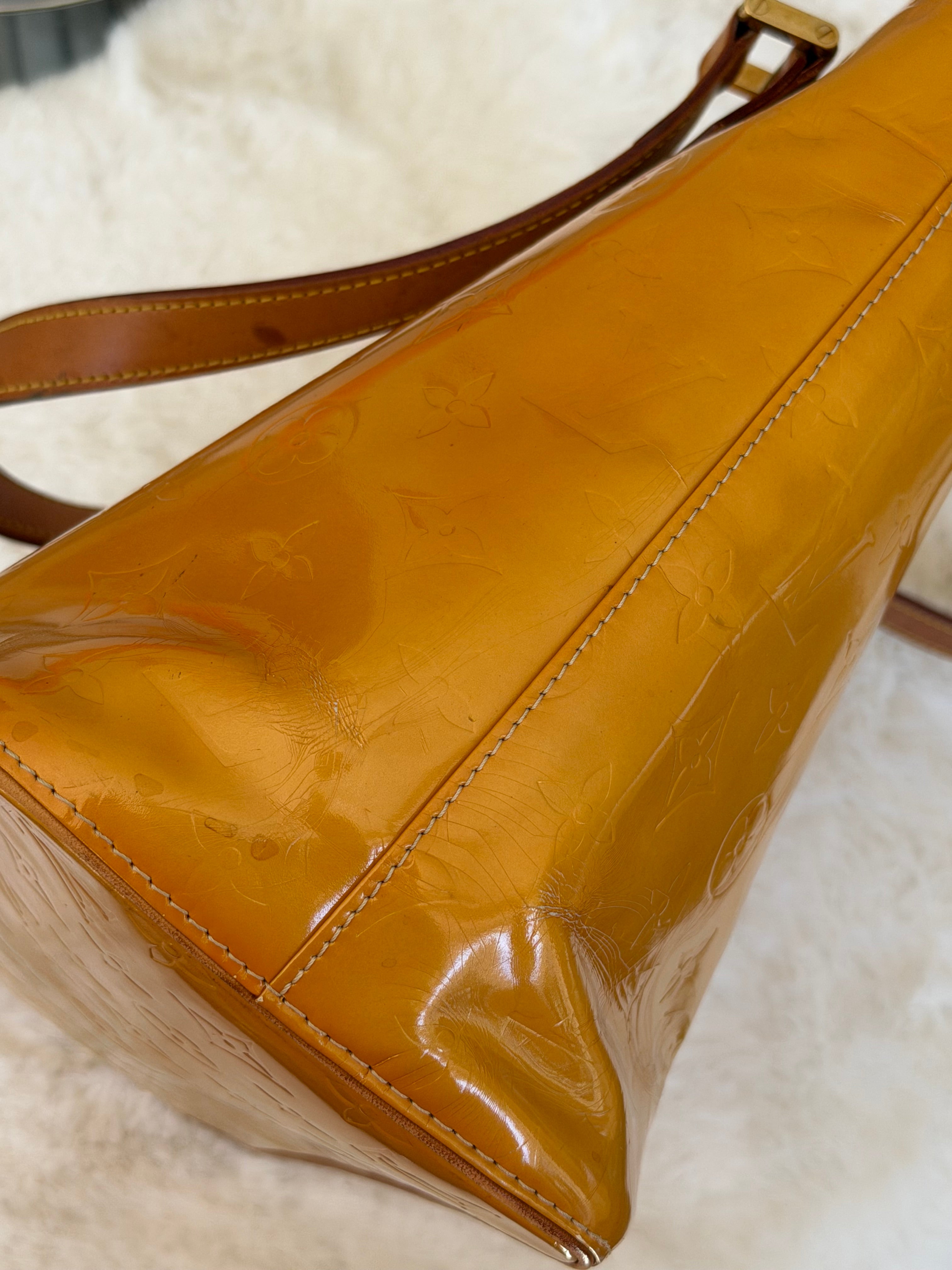 Louis Vuitton Houston in Yellow Vernis Leather