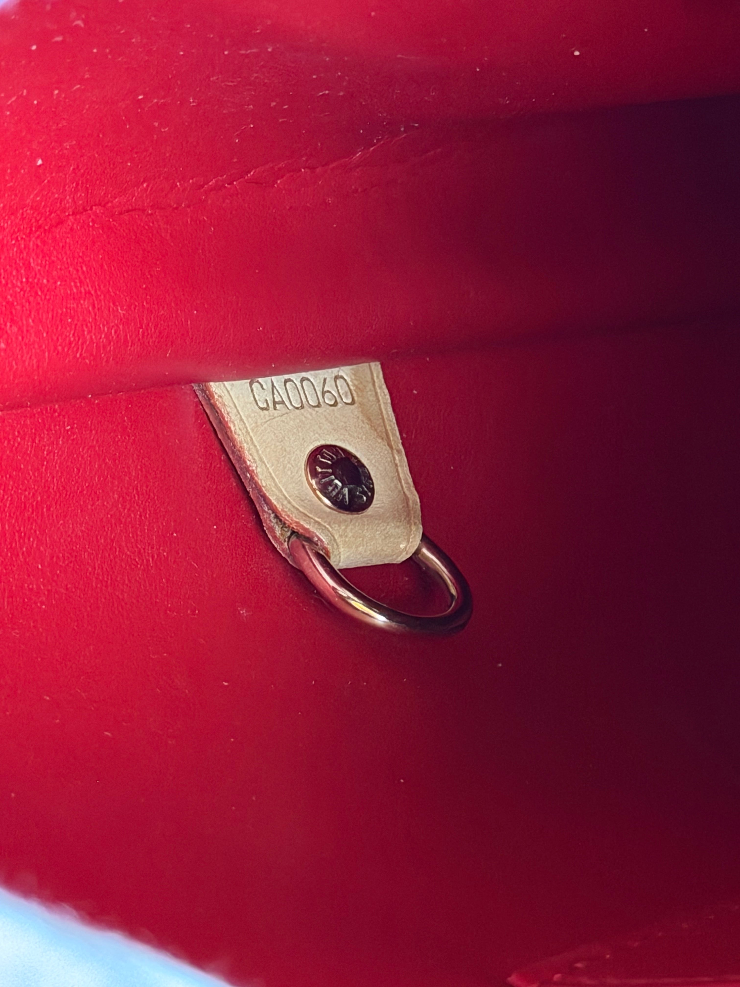 Louis Vuitton Houston in Red Vernis Leather