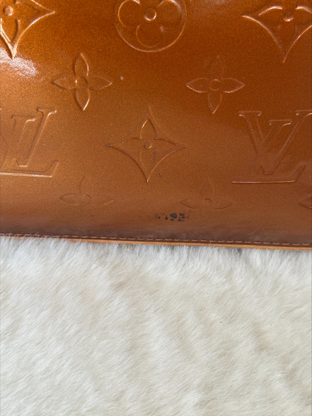 Louis Vuitton Houston in Bronze Vernis Leather