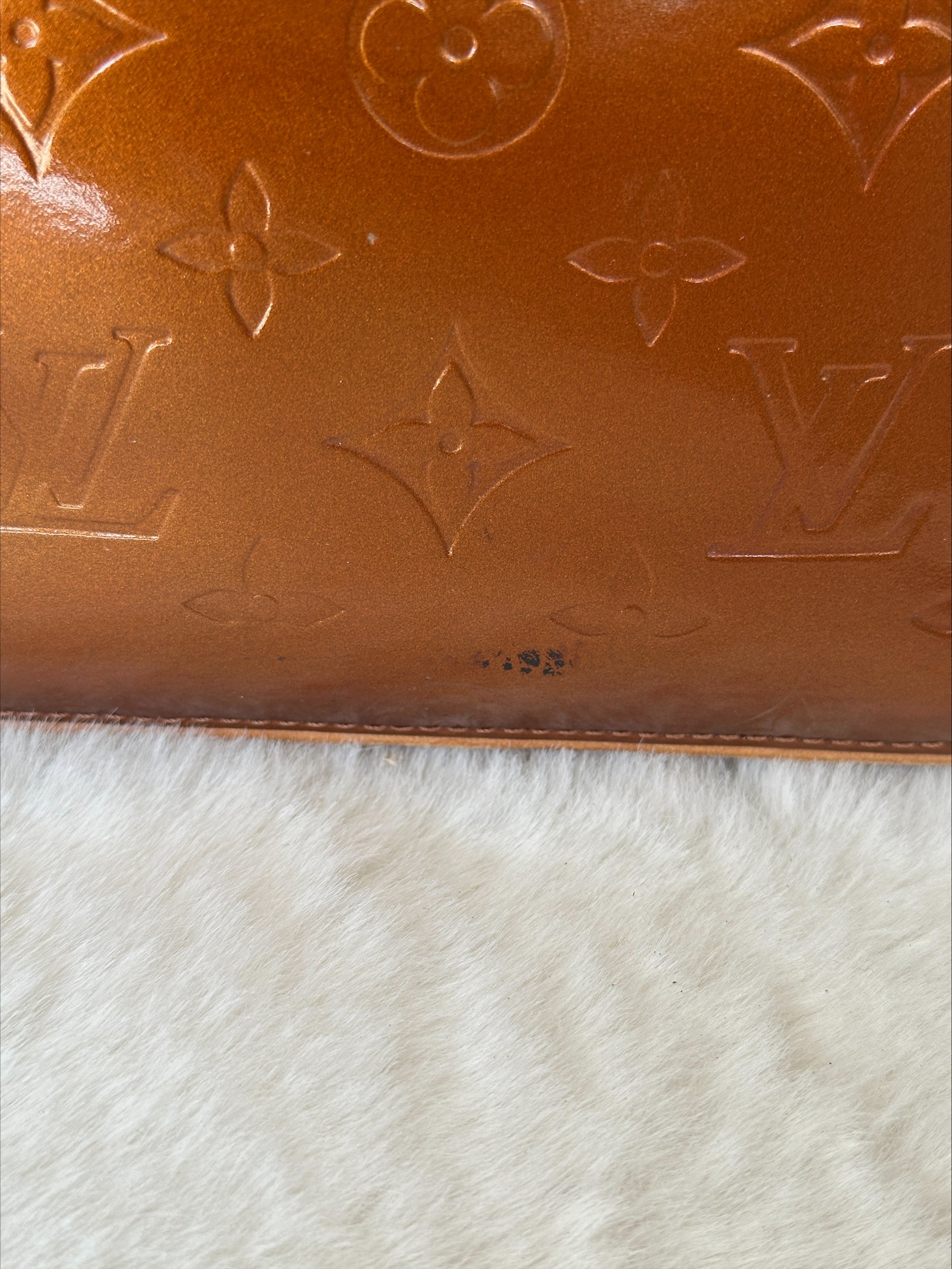 Louis Vuitton Houston in Bronze Vernis Leather
