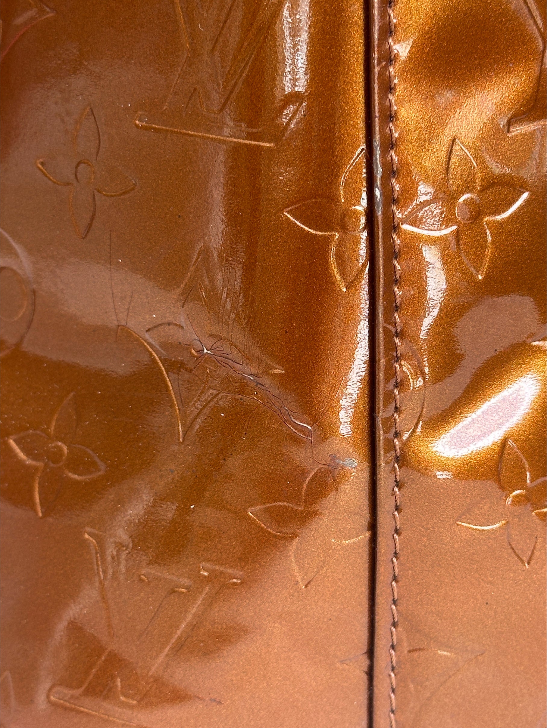 Louis Vuitton Houston in Bronze Vernis Leather