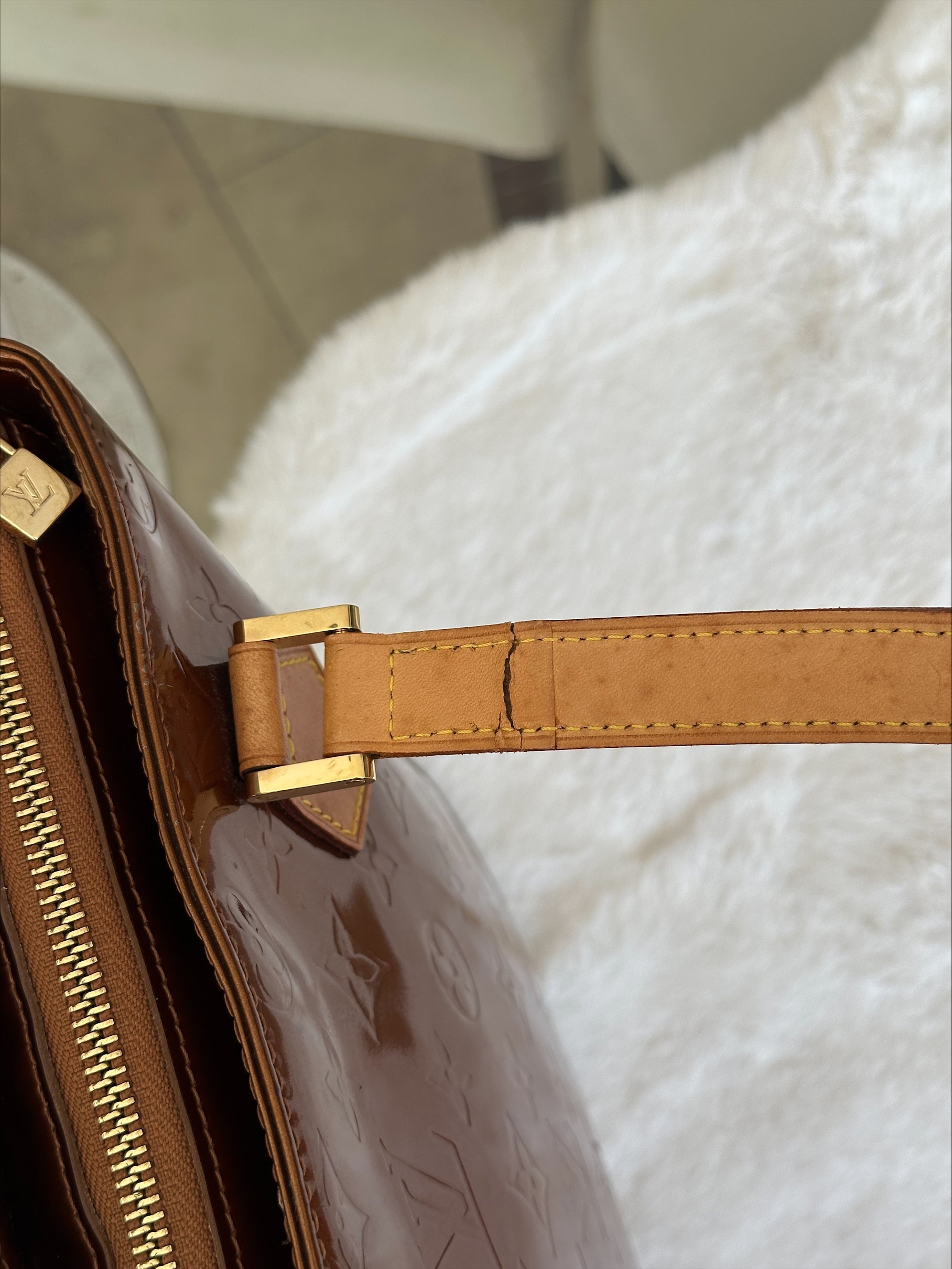 Louis Vuitton Houston in Bronze Vernis Leather