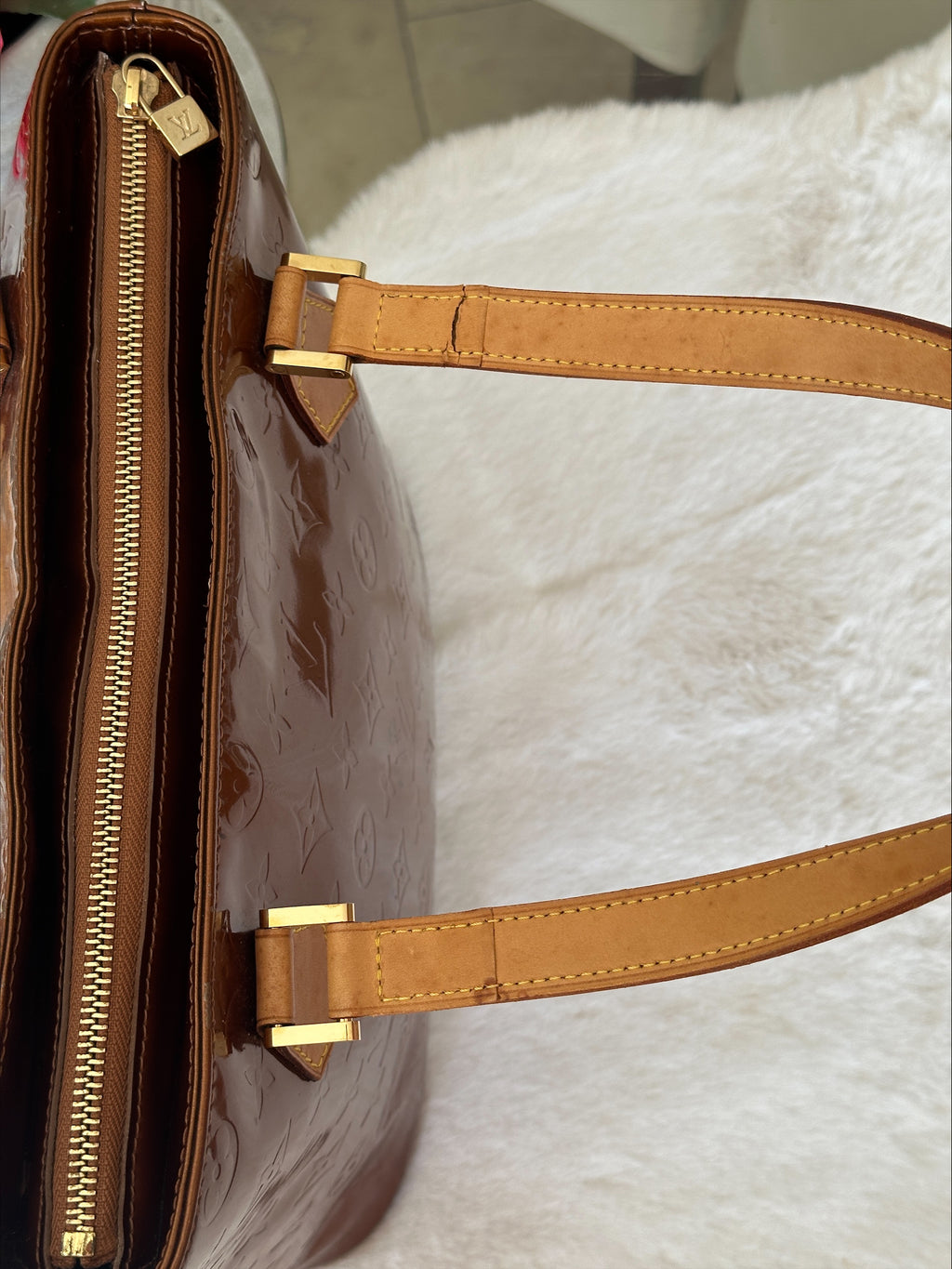 Louis Vuitton Houston in Bronze Vernis Leather
