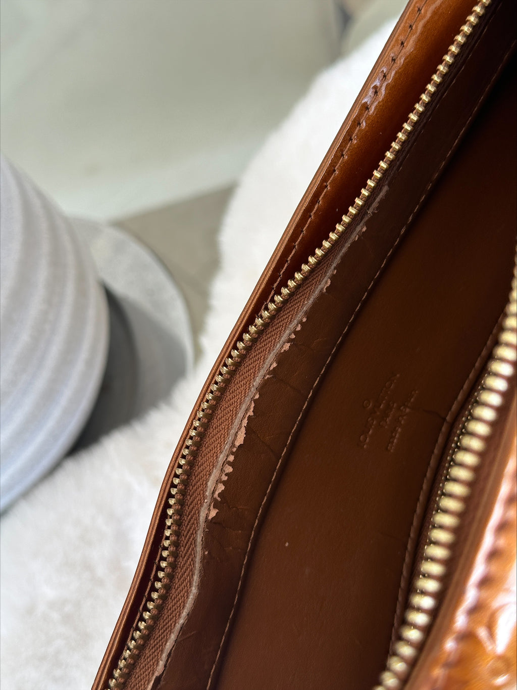 Louis Vuitton Houston in Bronze Vernis Leather