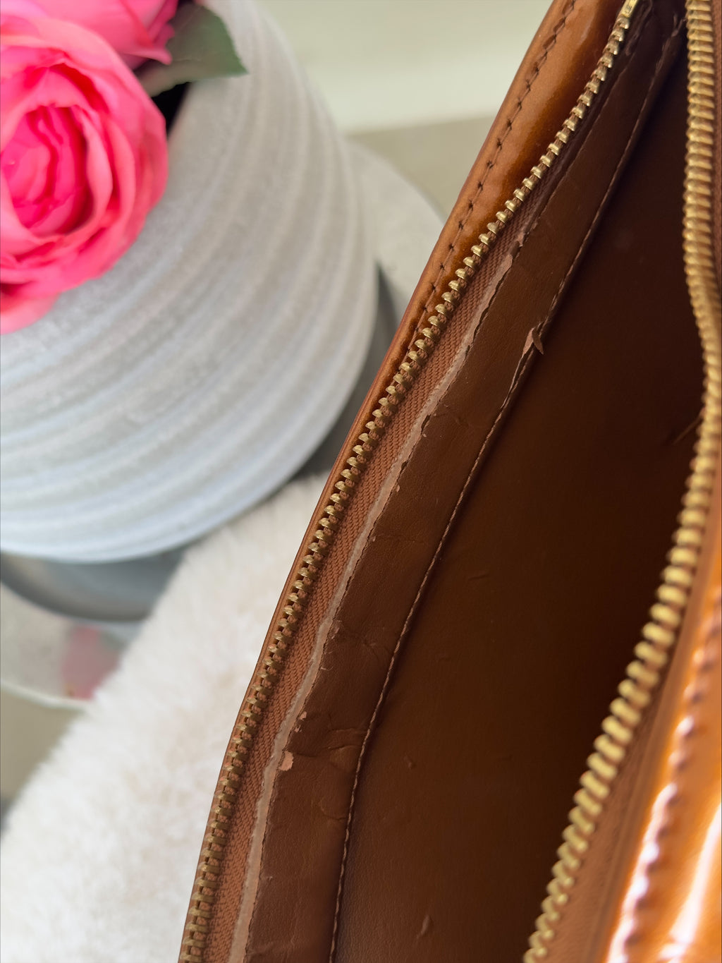 Louis Vuitton Houston in Bronze Vernis Leather